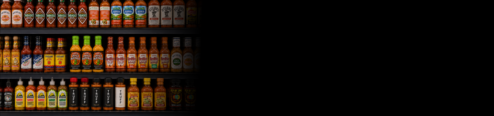 Ian's Dilly Buffalo bottles on a retail sauce shelf